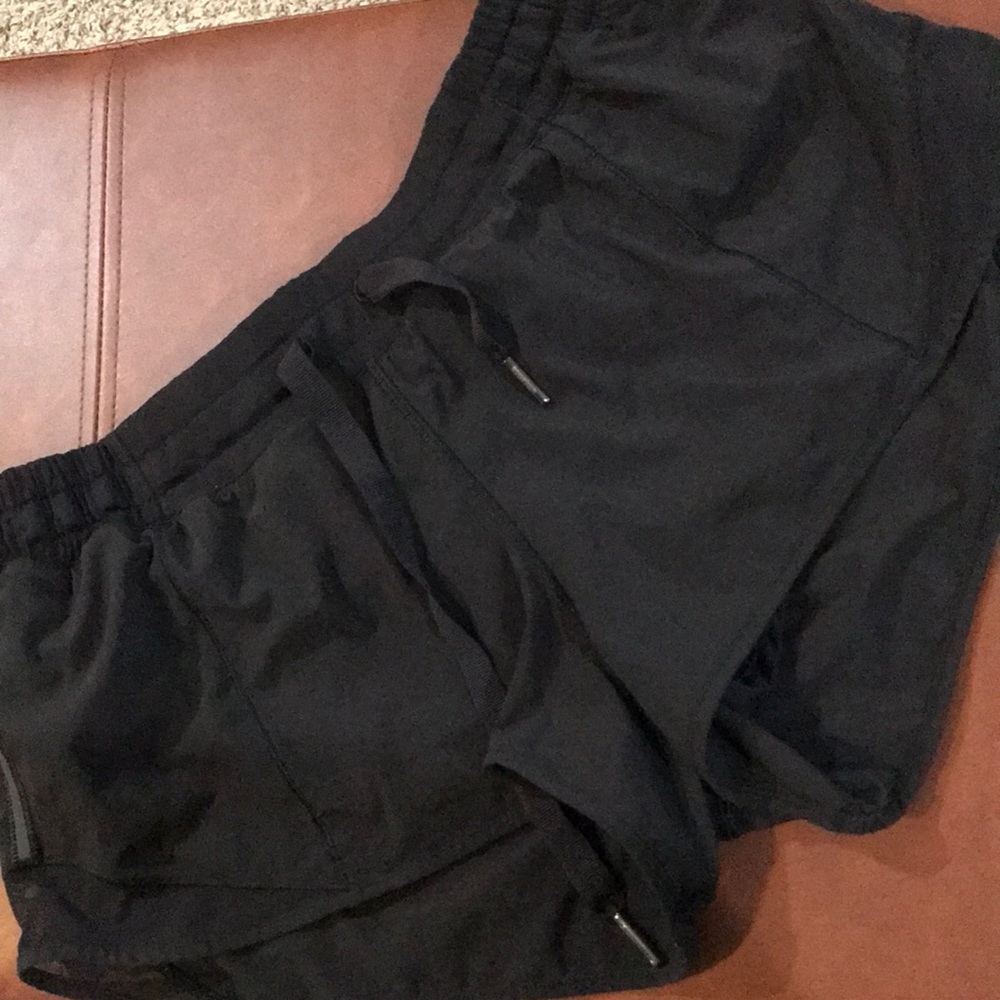 LIKE NEW! Black lulu lemon short with draw string size 8